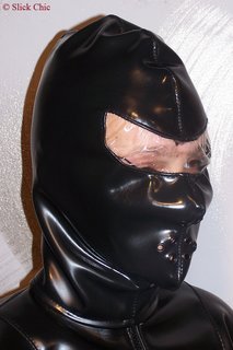 Mask with foil-covered eyes.