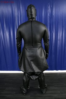 Punishment suit with d-rings and belts